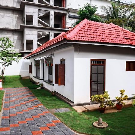 Appartement Bobbys Corner à Alappuzha Extérieur photo